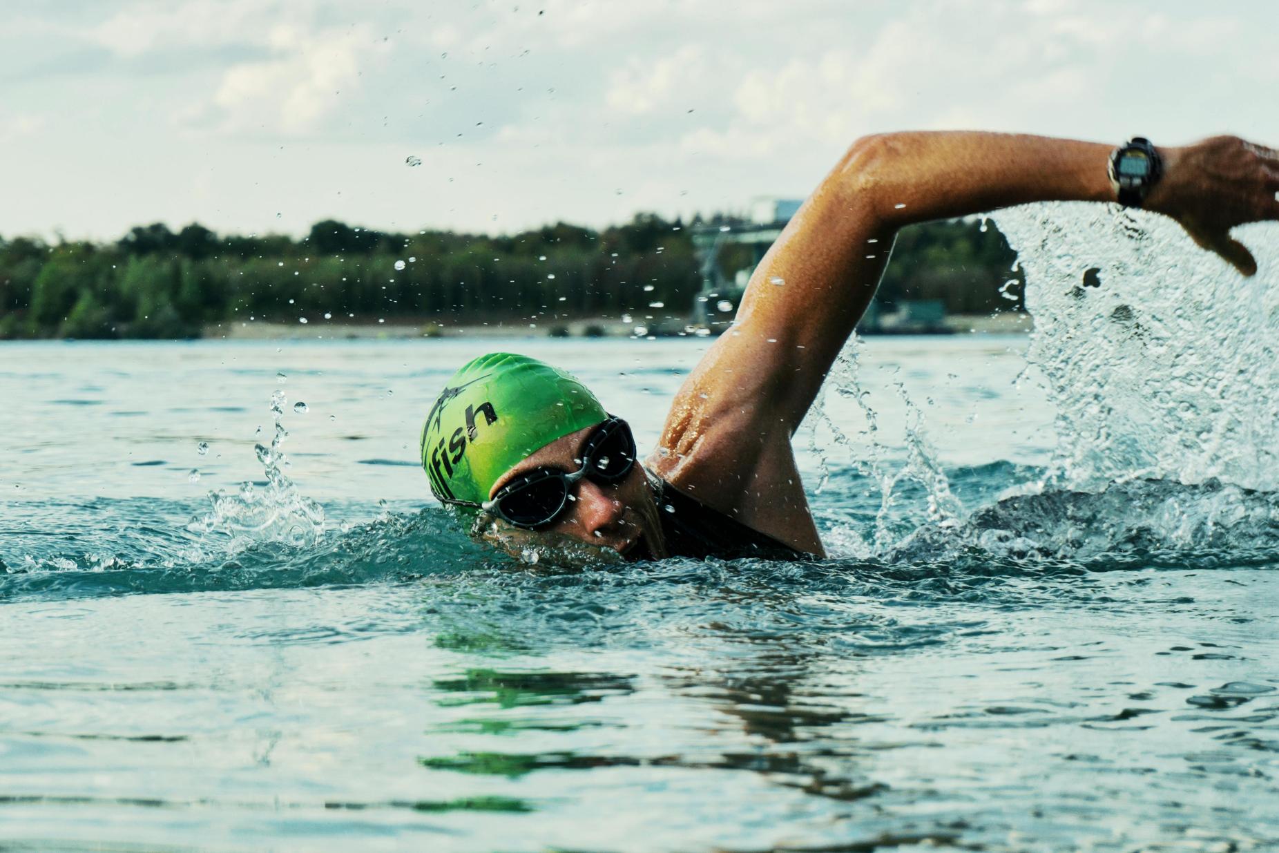 how to put on a swimming cap